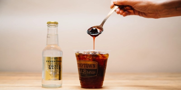 A spoon in a cup of liquid AI-generated content may be incorrect.